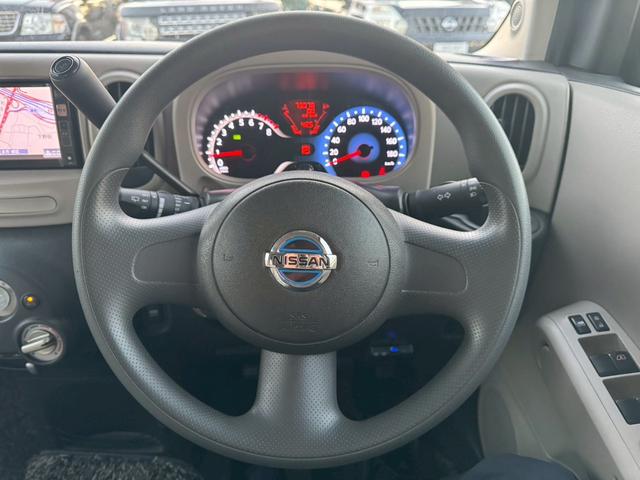 キューブ １５Ｘ　ナビ／テレビ／Ｂｌｕｅｔｏｏｔｈ／デジタルインナーミラー／ＥＴＣ／マニュアルエアコン／シガーソケット／電格ミラー／レベライザー／パワーウィンドウ／パワーステアリング／社外アルミホイール（27枚目）