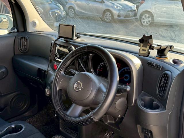 キューブ １５Ｘ　Ｍセレクション　社外ナビ／社外１５インチアルミホイール／ＨＩＤヘッドライト／マニュアルエアコン／ＥＴＣ／スマートキー／プッシュスタート／スペアキー／運転席助手席エアバック／ユーザー買取車（16枚目）