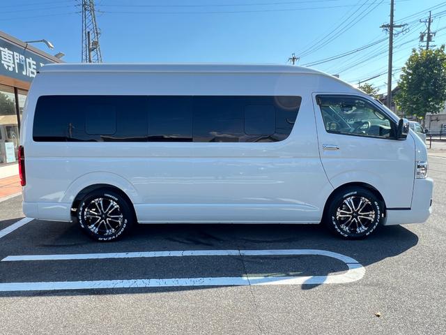 ハイエースコミューター スーパーロングGL 未登録新車/ディーゼルターボ/10人乗り3ナンバー構構造更済/11インチディスプレイオーディオ/ETC/前後カメラドラレコ/シートカバー/ローダウン/16AW/フロントスポイラー/LEDテール/TSS(2枚目)