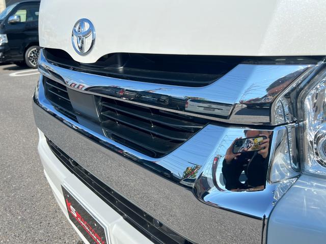 ハイエースコミューター スーパーロングGL 未登録新車/ディーゼルターボ/10人乗り3ナンバー構構造更済/11インチディスプレイオーディオ/ETC/前後カメラドラレコ/シートカバー/ローダウン/16AW/フロントスポイラー/LEDテール/TSS(63枚目)