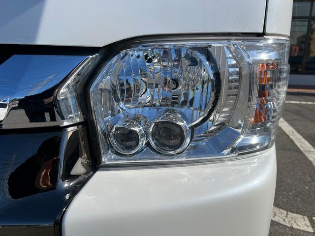 ハイエースバン スーパーＧＬ　５０ＴＨ　アニバーサリーリミテッド　２８００ディーゼルターボ／販売期間限定車／ワイドボディー＆ミドルルーフ／ローダウン＆１７ＡＷ／社外センターコンソール／両側パワースライドドア／フルセグナビ／ビルトインＥＴＣ／バックカメラ／専用内装色（65枚目）