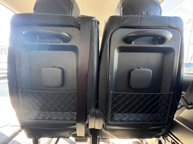 ハイエースコミューター スーパーロングＧＬ　１０人乗り３ナンバー登録／普通免許で運転可能／パワースライドドア／ＬＥＤヘッドランプ／ローダウン／Ｆスポイラー／パンデミック１６ＡＷ＆ＰＡＲＡＤＡ／シートカバー／黒木目インテリア／ナビ／ＥＴＣ／ＦＤＭ（25枚目）