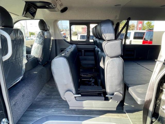ハイエースワゴン ＧＬ　未登録新車／４ＷＤ／Ｖｅｒ２内装架装サルーン２／フルフラット／対座対面シート／フローリング加工／ＢＩＧ－Ｘ１１インチ／アルパイン後席モニター／前後ドラレコ／ヘッドライトオリジナル塗装／１８インチＡＷ／（10枚目）