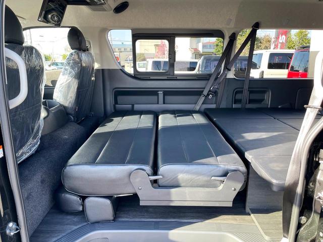 ハイエースワゴン ＧＬ　未登録新車／４ＷＤ／Ｖｅｒ２内装架装サルーン２／フルフラット／対座対面シート／フローリング加工／ＢＩＧ－Ｘ１１インチ／アルパイン後席モニター／前後ドラレコ／ヘッドライトオリジナル塗装／１８インチＡＷ／（13枚目）