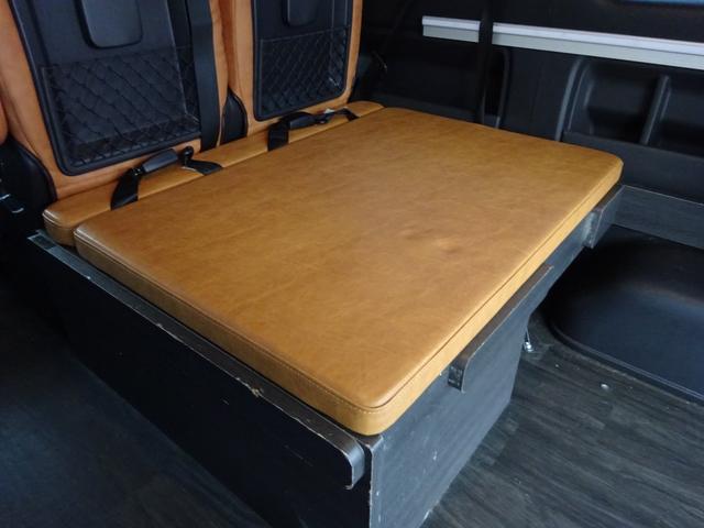 ハイエースワゴン ＧＬ　ユーザー買取車／内装架装／ベッドキット／キャンピングカー仕様／フルセグナビ／後席モニター／フリップダウンモニター／フローリング仕様／パノラミックビュ／全方位カメラ／フルフラット／ユーアイビークル足回り（52枚目）