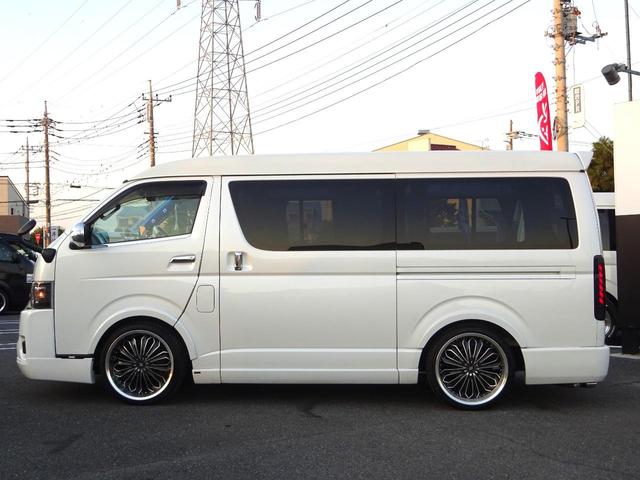 ハイエースワゴン GL ワゴン2.7GL ミドルルーフ/フェイスチェンジ/フルフラットシート/床張り加工済み/ラウンジスタイル内装フルベッド展開可能/LEDヘッドライト/インナーブラック/20インチAW/フローティングナビ(13枚目)