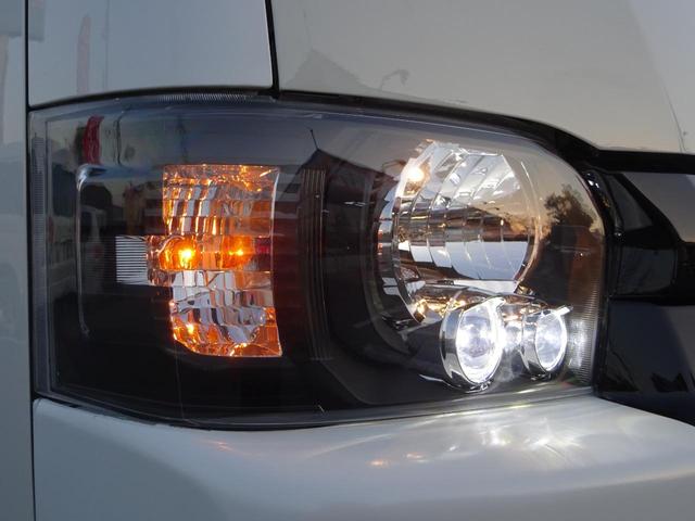 ハイエースワゴン GL ワゴン2.7GL ミドルルーフ/フェイスチェンジ/フルフラットシート/床張り加工済み/ラウンジスタイル内装フルベッド展開可能/LEDヘッドライト/インナーブラック/20インチAW/フローティングナビ(34枚目)