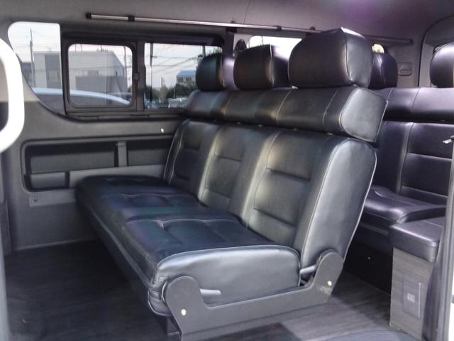ハイエースワゴン GL ユーザー買取車/ワンオーナー車/Flex使用フルフラットシート/3列目ベンチシート/フローリング施工/フロントリップ/ローダウン/社外17インチAWナスカーホワイトレター/ナビ/フリップダウンモニター(6枚目)