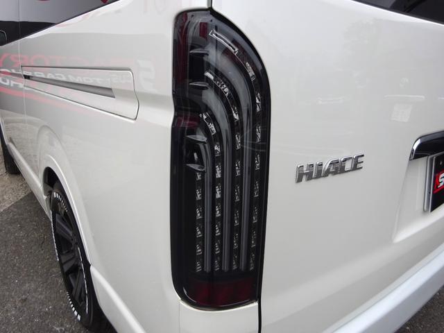 ハイエースワゴン GL ユーザー買取車/ワンオーナー車/Flex使用フルフラットシート/3列目ベンチシート/フローリング施工/フロントリップ/ローダウン/社外17インチAWナスカーホワイトレター/ナビ/フリップダウンモニター(25枚目)