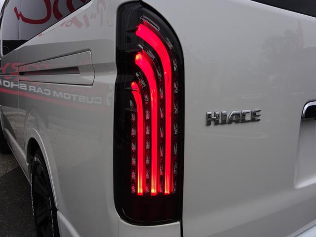 ハイエースワゴン GL ユーザー買取車/ワンオーナー車/Flex使用フルフラットシート/3列目ベンチシート/フローリング施工/フロントリップ/ローダウン/社外17インチAWナスカーホワイトレター/ナビ/フリップダウンモニター(26枚目)