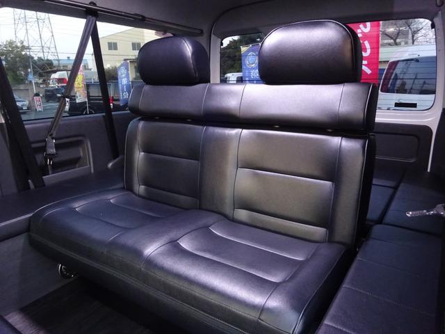 ハイエースワゴン GL ユーザー買取車/ワンオーナー車/Flex使用フルフラットシート/3列目ベンチシート/フローリング施工/フロントリップ/ローダウン/社外17インチAWナスカーホワイトレター/ナビ/フリップダウンモニター(41枚目)