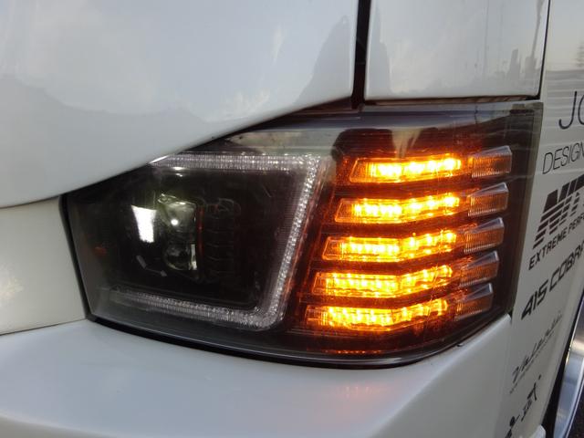 ハイエースワゴン GL ユーザー買取車/ジョーカーデザインフルエアロ/ALPINE BICX/ヴァレンティーヘッドライト/ヴァレンティーLEDテールランプ/ルーフスポイラー/社外ホイール17インチ/フルカスタム(25枚目)