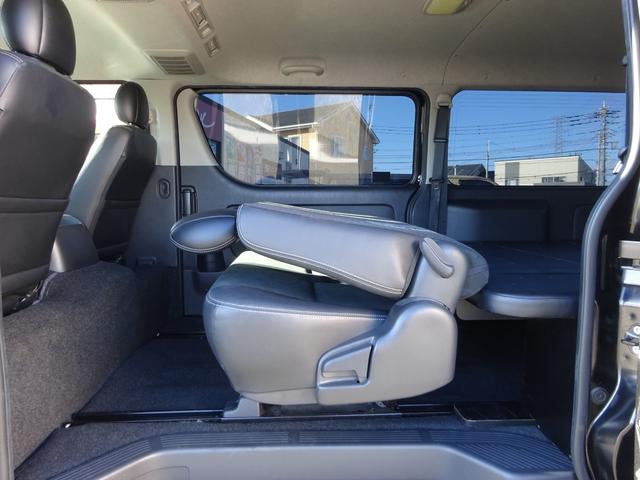 ハイエースバン スーパーGL ダークプライム ワンオーナー車/415コブラフルエアロ/バッドフェイスボンネット/415コブラバッドテール/415コブラバッドラッカー17インチナスカー/スライドレール付後部座席/ベッドキット/両側パワースライドドア(53枚目)