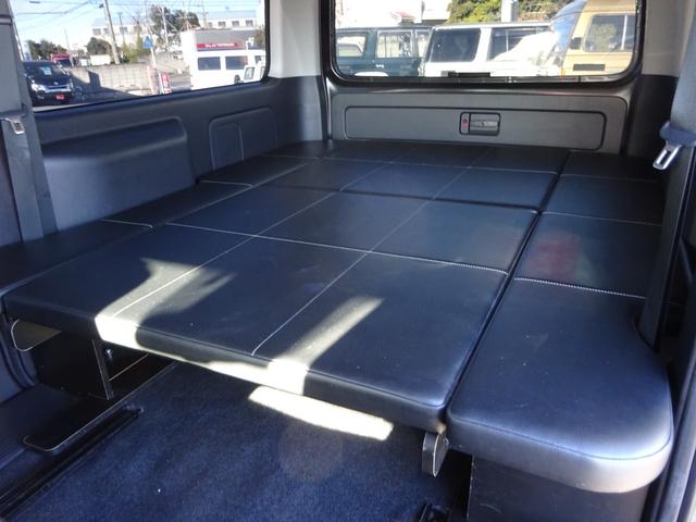 ハイエースバン スーパーGL ダークプライム ワンオーナー車/415コブラフルエアロ/バッドフェイスボンネット/415コブラバッドテール/415コブラバッドラッカー17インチナスカー/スライドレール付後部座席/ベッドキット/両側パワースライドドア(56枚目)