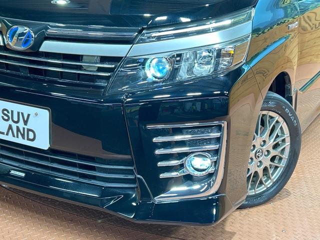ヴォクシー ハイブリッドＺＳ　煌ＩＩ　禁煙　後席モニター　ＴＲＤエアロ　ＢＩＧ－Ｘ１１インチナビ　バックカメラ　両側電動ドア　ＥＴＣ　オートマチックハイビーム　トヨタセーフティーセンス　ＬＥＤヘッドライト　純正１６インチアルミ（13枚目）