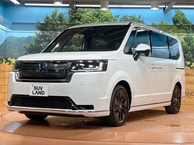 ステップワゴン ｅ：ＨＥＶスパーダ　登録済未使用車　純正１１型ナビ　電動リアゲート　ブラインドスポットモニター　両側電動ドア　バックカメラ　シートヒーター　パドルシフト　コーナーセンサー　フルセグ　ＤＶＤ＆ＣＤ　ＬＥＤヘッドライト（30枚目）