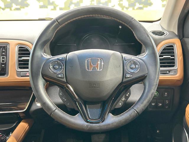 ヴェゼル ハイブリッドZ・ホンダセンシング 禁煙 純正ナビ バックカメラ レーダークルーズコントロール ETC シートヒーター ルーフレール LEDヘッドライト 純正17インチアルミ ハーフレザーシート フルセグ DVD&CD Bluetoot(11枚目)