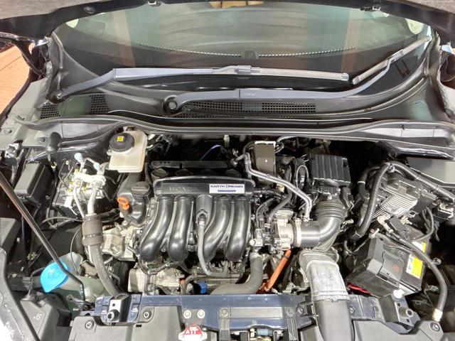 ヴェゼル ハイブリッドZ・ホンダセンシング 禁煙 純正ナビ バックカメラ レーダークルーズコントロール ETC シートヒーター ルーフレール LEDヘッドライト 純正17インチアルミ ハーフレザーシート フルセグ DVD&CD Bluetoot(18枚目)