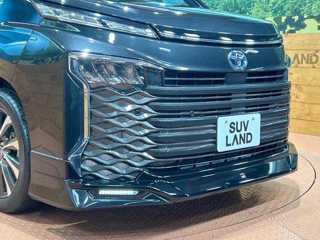 ヴォクシー ハイブリッドS-Z 禁煙 後席モニター 快適利便PKG ユニバーサルステップ GRエアロ 純正10.5型ナビ CD/DVDデッキ フルセグ 両側電動ドア AC100V 前中席シートヒーター ステアリングヒーター(8枚目)