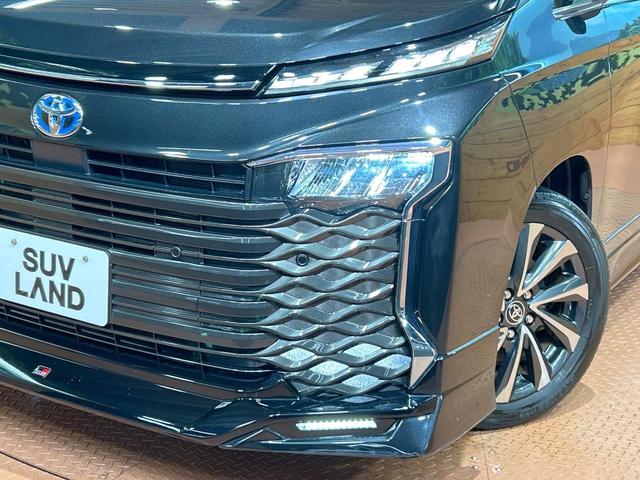 ヴォクシー ハイブリッドS-Z 禁煙 後席モニター 快適利便PKG ユニバーサルステップ GRエアロ 純正10.5型ナビ CD/DVDデッキ フルセグ 両側電動ドア AC100V 前中席シートヒーター ステアリングヒーター(15枚目)