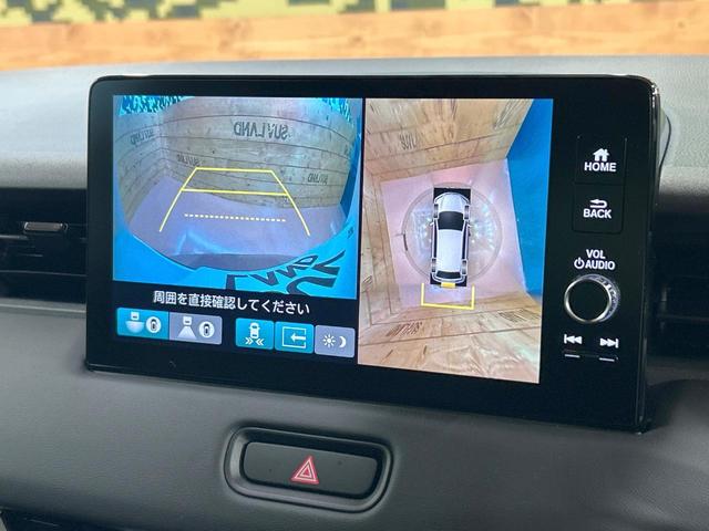 ヴェゼル ｅ：ＨＥＶ　Ｚ　登録済未使用車　ホンダコネクトディスプレイ　ホンダセンシング　ワイヤレス充電　マルチビューカメラシステム　プレミアムオーディオ　クリアランスソナー　シートヒーター　ステアリングヒーター　電動リアゲート（5枚目）