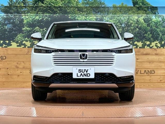 ヴェゼル ｅ：ＨＥＶ　Ｚ　登録済未使用車　ホンダコネクトディスプレイ　ホンダセンシング　ワイヤレス充電　マルチビューカメラシステム　プレミアムオーディオ　クリアランスソナー　シートヒーター　ステアリングヒーター　電動リアゲート（14枚目）