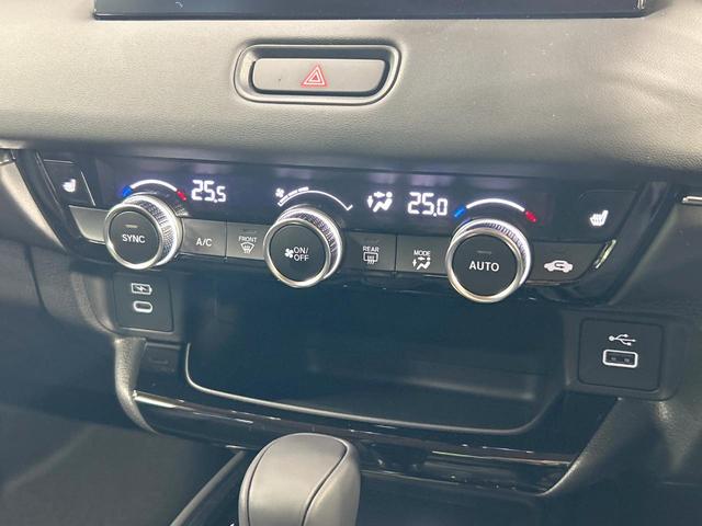 ヴェゼル ｅ：ＨＥＶ　Ｚ　登録済未使用車　ホンダコネクトディスプレイ　ホンダセンシング　ワイヤレス充電　マルチビューカメラシステム　プレミアムオーディオ　クリアランスソナー　シートヒーター　ステアリングヒーター　電動リアゲート（50枚目）