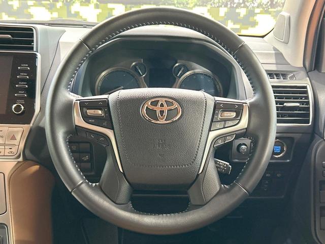 ランドクルーザープラド TX Lパッケージ 70thアニバーサリーリミテッド 禁煙車 サンルーフ 7人乗り 全周囲カメラ 9型ナビ フルセグ ルーフレール ブラインドスポットモニター クリアランスソナー レーダークルーズ シートエアコン LEDヘッドライト 純正18インチAW(13枚目)