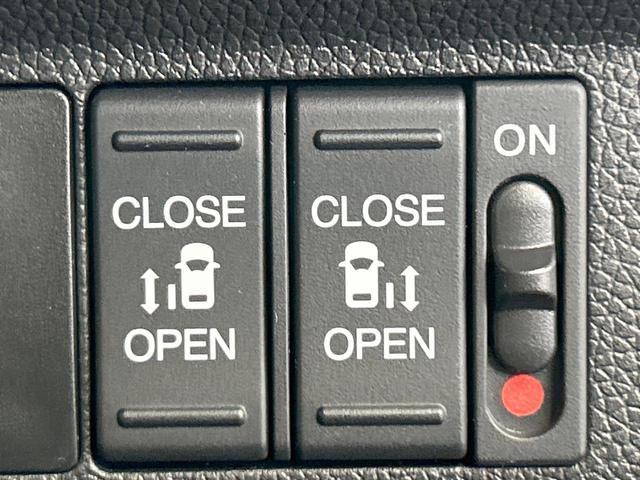 フリードハイブリッド ハイブリッド・Gホンダセンシング 禁煙 ディスプレイオーディオ バックカメラ 両側電動ドア シートヒーター ETC LEDヘッドライト レーダークルーズコントロール ハーフレザーシート 純正15インチアルミ 本革巻きステアリング(5枚目)