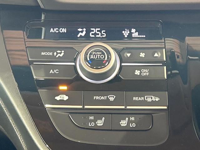 フリードハイブリッド ハイブリッド・Gホンダセンシング 禁煙 ディスプレイオーディオ バックカメラ 両側電動ドア シートヒーター ETC LEDヘッドライト レーダークルーズコントロール ハーフレザーシート 純正15インチアルミ 本革巻きステアリング(6枚目)