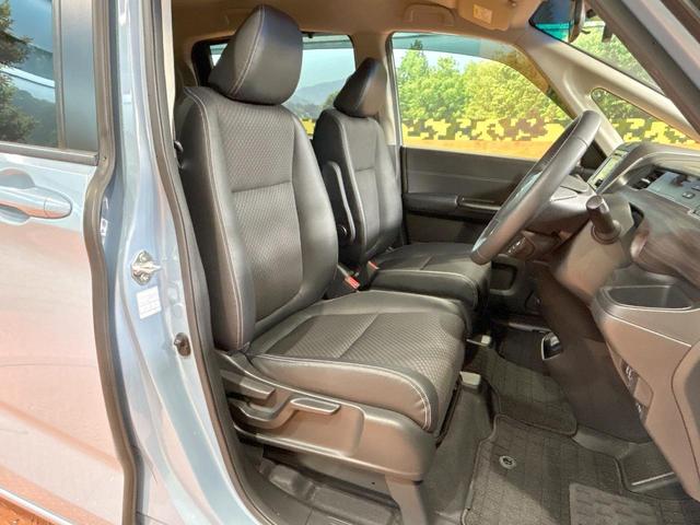 フリードハイブリッド ハイブリッド・Gホンダセンシング 禁煙 ディスプレイオーディオ バックカメラ 両側電動ドア シートヒーター ETC LEDヘッドライト レーダークルーズコントロール ハーフレザーシート 純正15インチアルミ 本革巻きステアリング(8枚目)