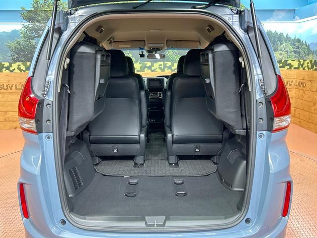 フリードハイブリッド ハイブリッド・Gホンダセンシング 禁煙 ディスプレイオーディオ バックカメラ 両側電動ドア シートヒーター ETC LEDヘッドライト レーダークルーズコントロール ハーフレザーシート 純正15インチアルミ 本革巻きステアリング(11枚目)