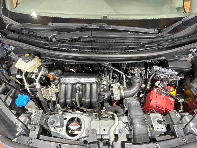 フリードハイブリッド ハイブリッド・Gホンダセンシング 禁煙 ディスプレイオーディオ バックカメラ 両側電動ドア シートヒーター ETC LEDヘッドライト レーダークルーズコントロール ハーフレザーシート 純正15インチアルミ 本革巻きステアリング(18枚目)