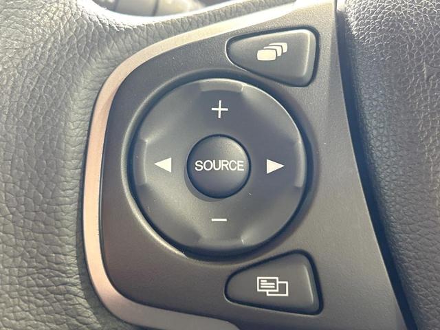 フリードハイブリッド ハイブリッド・Gホンダセンシング 禁煙 ディスプレイオーディオ バックカメラ 両側電動ドア シートヒーター ETC LEDヘッドライト レーダークルーズコントロール ハーフレザーシート 純正15インチアルミ 本革巻きステアリング(26枚目)