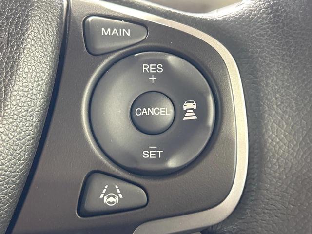 フリードハイブリッド ハイブリッド・Gホンダセンシング 禁煙 ディスプレイオーディオ バックカメラ 両側電動ドア シートヒーター ETC LEDヘッドライト レーダークルーズコントロール ハーフレザーシート 純正15インチアルミ 本革巻きステアリング(28枚目)