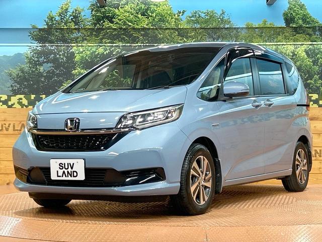フリードハイブリッド ハイブリッド・Gホンダセンシング 禁煙 ディスプレイオーディオ バックカメラ 両側電動ドア シートヒーター ETC LEDヘッドライト レーダークルーズコントロール ハーフレザーシート 純正15インチアルミ 本革巻きステアリング(43枚目)