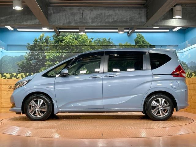 フリードハイブリッド ハイブリッド・Gホンダセンシング 禁煙 ディスプレイオーディオ バックカメラ 両側電動ドア シートヒーター ETC LEDヘッドライト レーダークルーズコントロール ハーフレザーシート 純正15インチアルミ 本革巻きステアリング(44枚目)