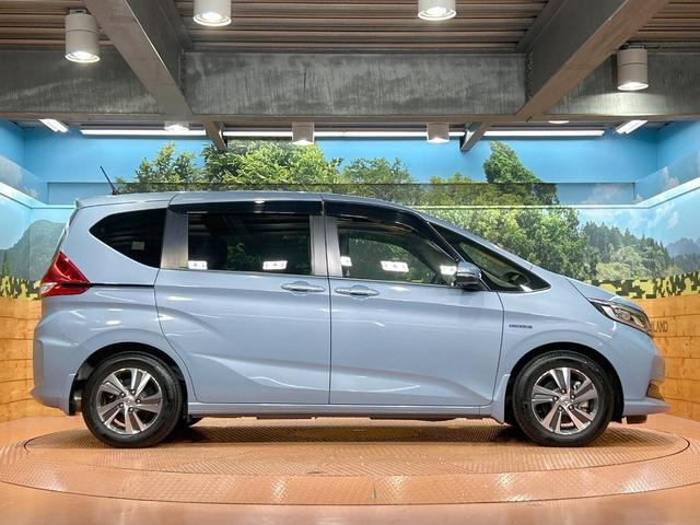 フリードハイブリッド ハイブリッド・Gホンダセンシング 禁煙 ディスプレイオーディオ バックカメラ 両側電動ドア シートヒーター ETC LEDヘッドライト レーダークルーズコントロール ハーフレザーシート 純正15インチアルミ 本革巻きステアリング(46枚目)