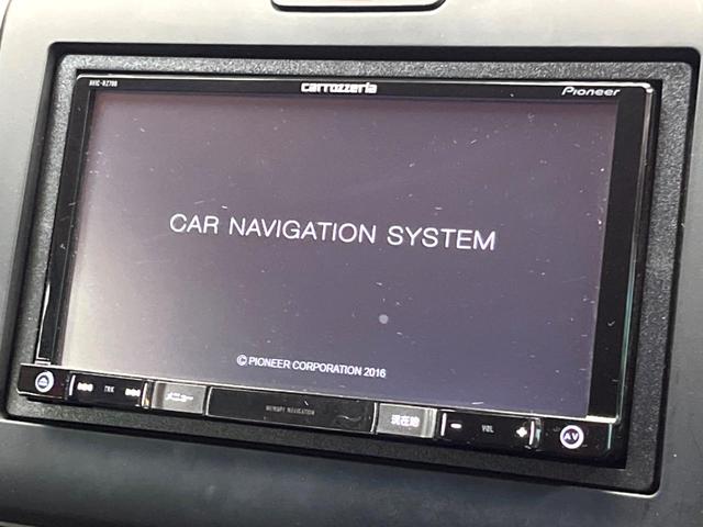 フリード G 禁煙車 SDナビ フルセグ バックカメラ パワースライドドア アイドリングストップ ビルトインETC オートエアコン ウォークスルー CD/DVD再生 Bluetooth接続可 スマートキー(3枚目)