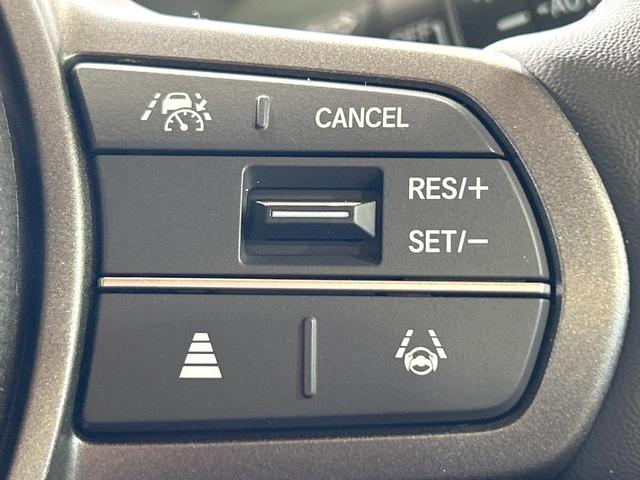 フリード ｅ：ＨＥＶクロスター　登録済未使用車　両側電動ドア　ルーフレール　ブラインドスポットモニター　レーダークルーズコントロール　シートヒーター　ホンダセンシング　ハーフレザーシート　純正１５インチＡＷ　ウォークスルー（6枚目）