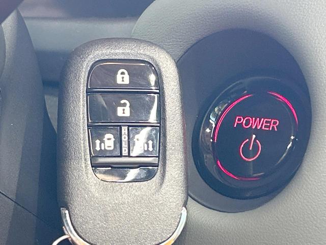 フリード ｅ：ＨＥＶクロスター　登録済未使用車　両側電動ドア　ルーフレール　ブラインドスポットモニター　レーダークルーズコントロール　シートヒーター　ホンダセンシング　ハーフレザーシート　純正１５インチＡＷ　ウォークスルー（23枚目）