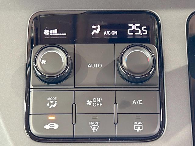 フリード ｅ：ＨＥＶクロスター　登録済未使用車　両側電動ドア　ルーフレール　ブラインドスポットモニター　レーダークルーズコントロール　シートヒーター　ホンダセンシング　ハーフレザーシート　純正１５インチＡＷ　ウォークスルー（32枚目）
