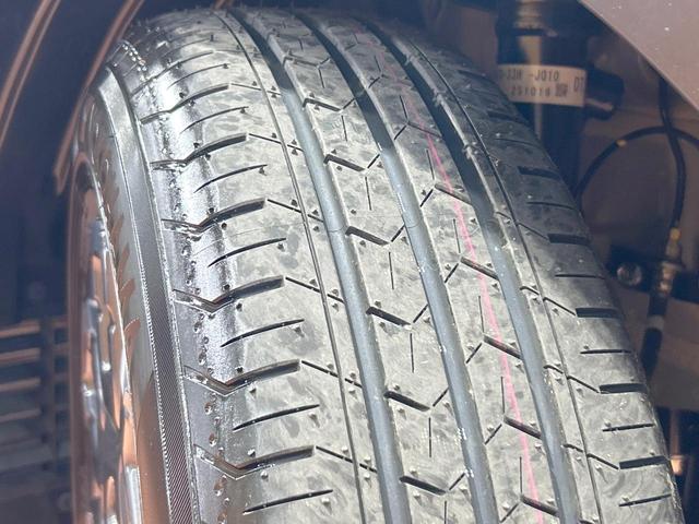 フリード ｅ：ＨＥＶクロスター　登録済未使用車　両側電動ドア　ルーフレール　ブラインドスポットモニター　レーダークルーズコントロール　シートヒーター　ホンダセンシング　ハーフレザーシート　純正１５インチＡＷ　ウォークスルー（48枚目）