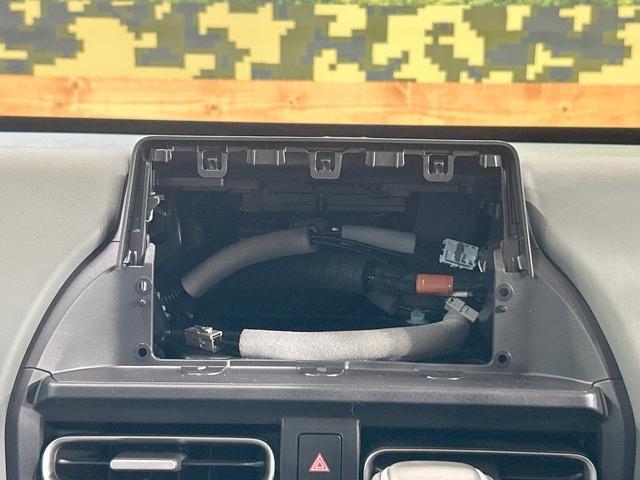 フリード ｅ：ＨＥＶクロスター　登録済未使用車　両側電動ドア　ルーフレール　ブラインドスポットモニター　レーダークルーズコントロール　シートヒーター　ホンダセンシング　ハーフレザーシート　純正１５インチＡＷ　ウォークスルー（57枚目）