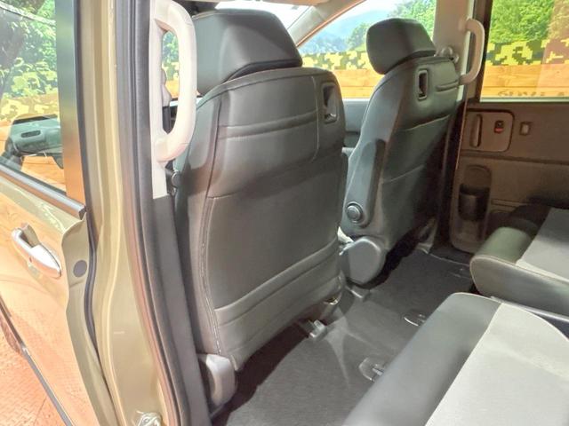 フリード ｅ：ＨＥＶクロスター　登録済未使用車　両側電動ドア　ルーフレール　ブラインドスポットモニター　レーダークルーズコントロール　シートヒーター　ホンダセンシング　ハーフレザーシート　純正１５インチＡＷ　ウォークスルー（61枚目）