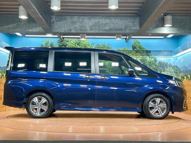 ステップワゴンスパーダ e:HEVスパーダ G ホンダセンシング 禁煙 純正9型ナビ 全周囲カメラ 両側電動ドア レーダークルーズコントロール ETC LEDヘッドライト 純正16インチアルミ ステアリングリモコン フルセグ Bluetooth DVD&CD(28枚目)