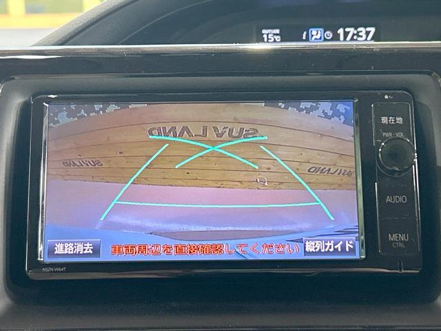 ノア ハイブリッドＸ　禁煙　後席モニター　純正ナビ　両側電動ドア　バックカメラ　スマートキー　ＬＥＤヘッドライト　純正１５インチアルミ　スペアタイヤ　ＥＴＣ　横滑り防止　デュアルエアコン　オートライト　プライバシーガラス（4枚目）