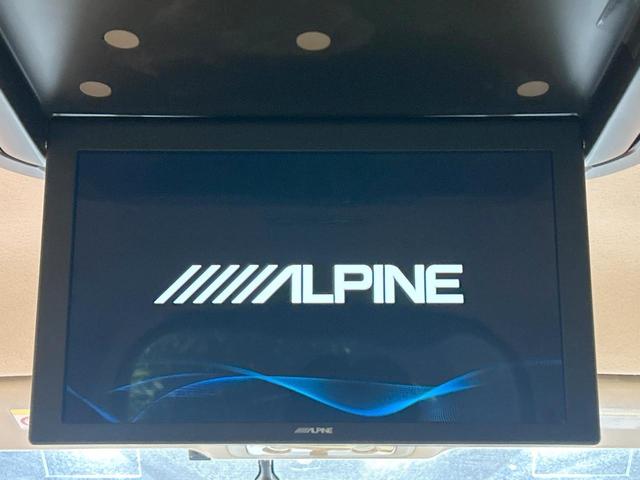 ノア ハイブリッドＸ　禁煙　後席モニター　純正ナビ　両側電動ドア　バックカメラ　スマートキー　ＬＥＤヘッドライト　純正１５インチアルミ　スペアタイヤ　ＥＴＣ　横滑り防止　デュアルエアコン　オートライト　プライバシーガラス（5枚目）