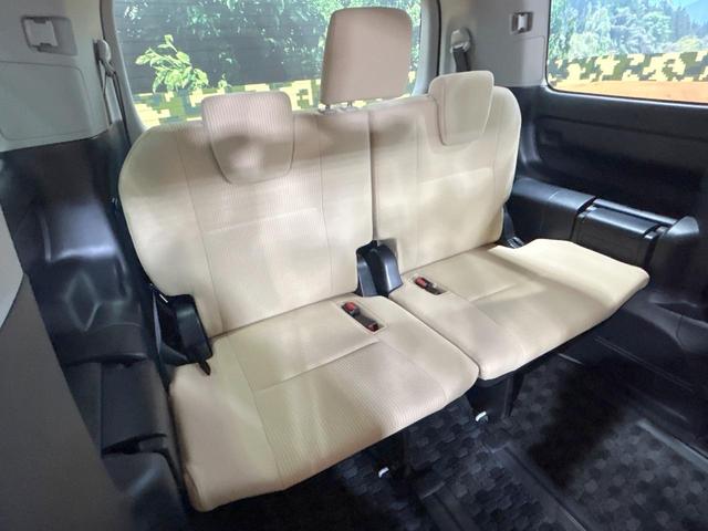 ノア ハイブリッドＸ　禁煙　後席モニター　純正ナビ　両側電動ドア　バックカメラ　スマートキー　ＬＥＤヘッドライト　純正１５インチアルミ　スペアタイヤ　ＥＴＣ　横滑り防止　デュアルエアコン　オートライト　プライバシーガラス（11枚目）