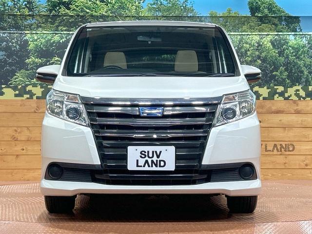 ノア ハイブリッドＸ　禁煙　後席モニター　純正ナビ　両側電動ドア　バックカメラ　スマートキー　ＬＥＤヘッドライト　純正１５インチアルミ　スペアタイヤ　ＥＴＣ　横滑り防止　デュアルエアコン　オートライト　プライバシーガラス（16枚目）